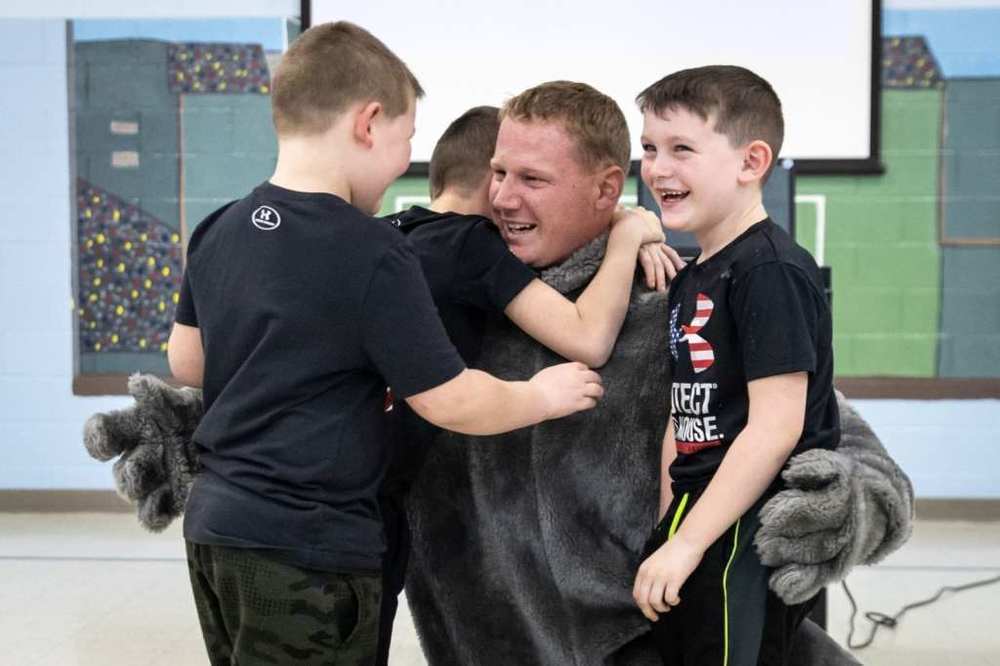 Three Rockland Siblings Surprised by Father’s Return from Army National Guard Deployment at Esten Elementary School Event